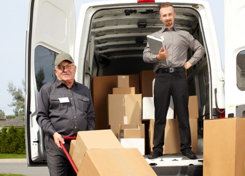 Student removals planning in Hammersmith with packed boxes and moving checklist