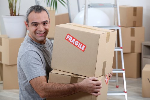 Removal van loading household items for a local Hammersmith move