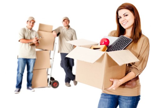 Professional movers transporting boxes in Hammersmith