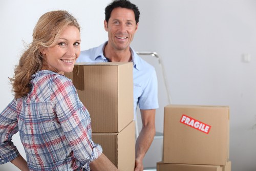 Professional removal van service loading boxes for a flat move in Hammersmith