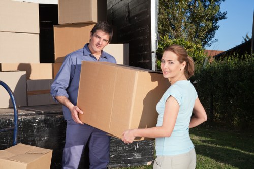 Local house removalists in Hammersmith loading a van outside a London property